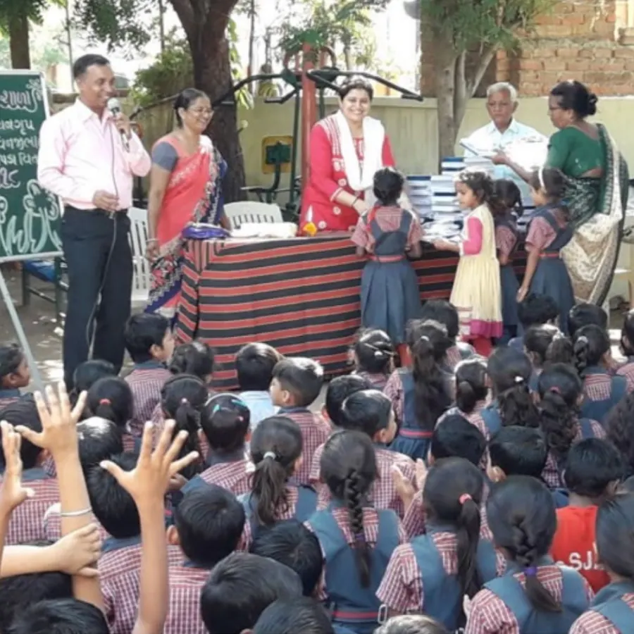 Book distribution at a school assembly